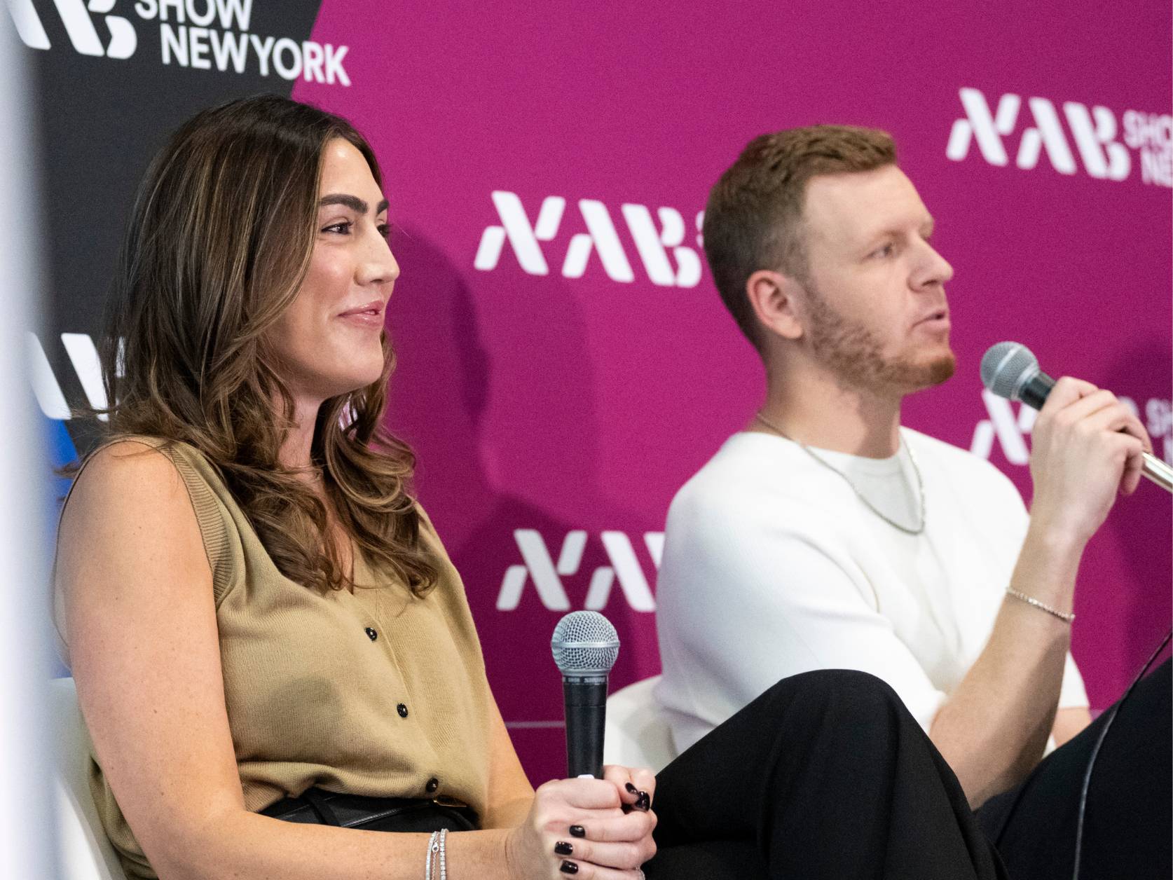 Photo of Lauren Inganamort and Michael Jones speaking on the show floor at NAB New York